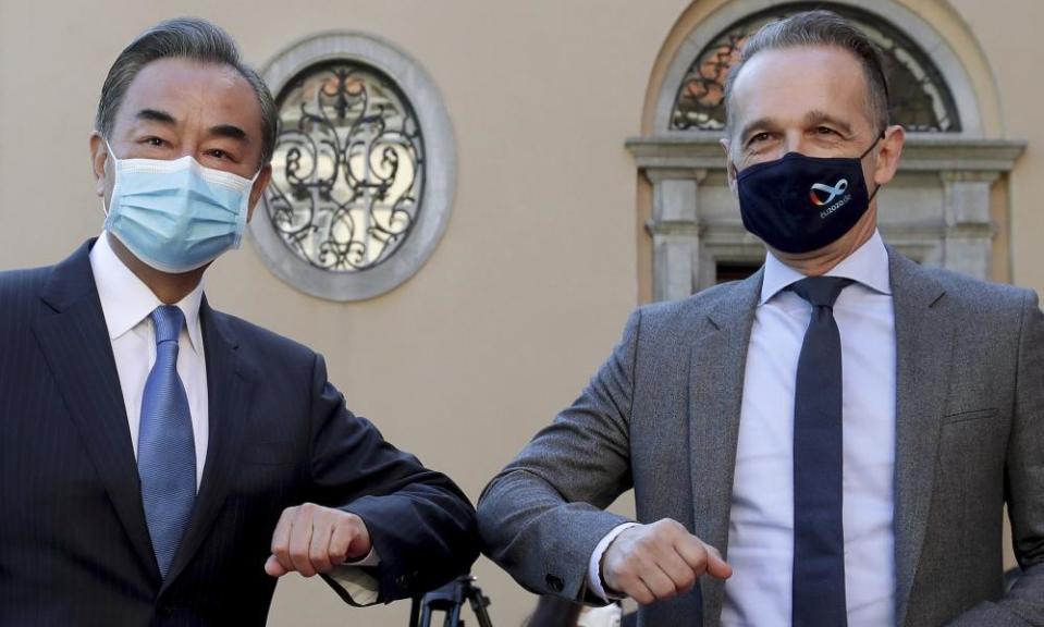 China’s foreign minister, Wang Yi, and the German foreign minister, Heiko Maas.