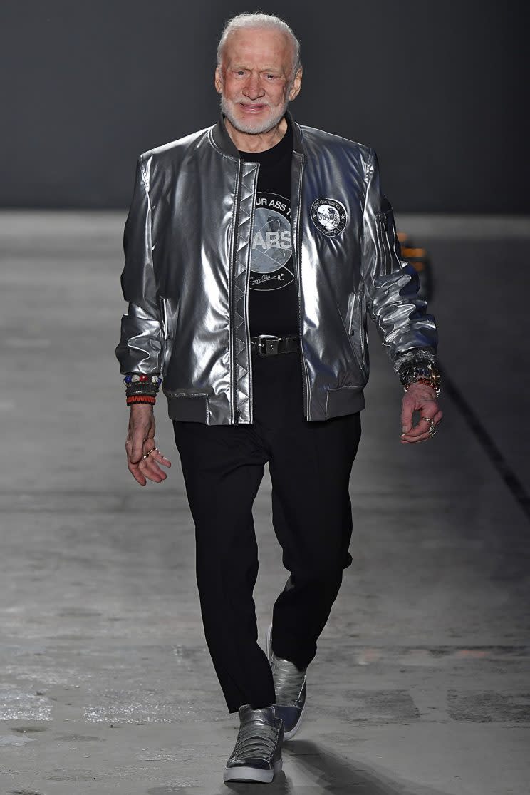 Buzz Aldrin walks the runway. (Photo: Getty Images)