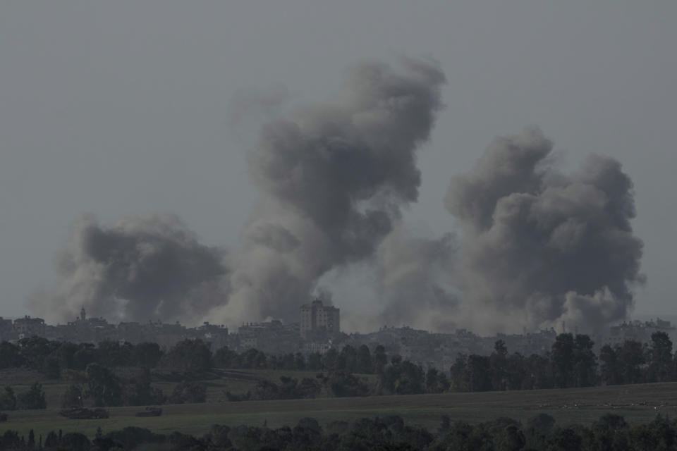 Smoke rises following an Israeli bombardment in the Gaza Strip, as seen from southern Israel, Tuesday, Dec. 26, 2023. The army is battling Palestinian militants across Gaza in the war ignited by Hamas' Oct. 7 attack into Israel. (AP Photo/Leo Correa)