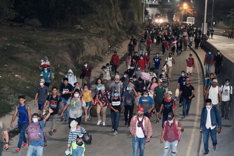 Hondurans take part in a new caravan of migrants, set to head to the United States, in San Pedro Sula