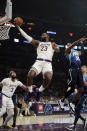 Los Angeles Lakers' LeBron James (23) drives to the basket against the Dallas Mavericks during the first half of an NBA basketball game Sunday, Dec. 1, 2019, in Los Angeles. (AP Photo/Marcio Jose Sanchez)