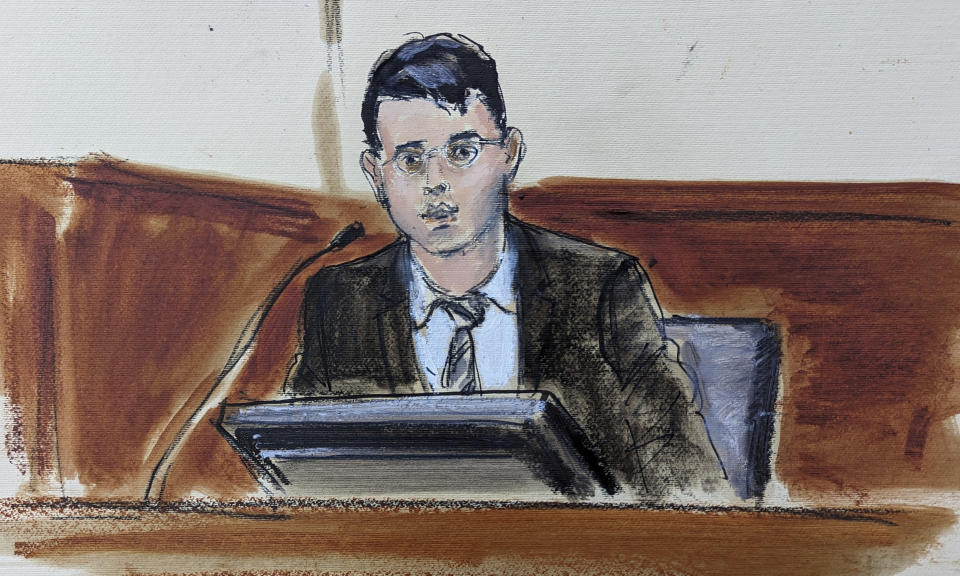 This courtroom sketch shows Adam Yedidia, former FTX and Alameda Research employee and former friend of Sam Bankman-Fried, testifying, Wednesday, Oct. 4, 2023. (AP Photo/Elizabeth Williams)