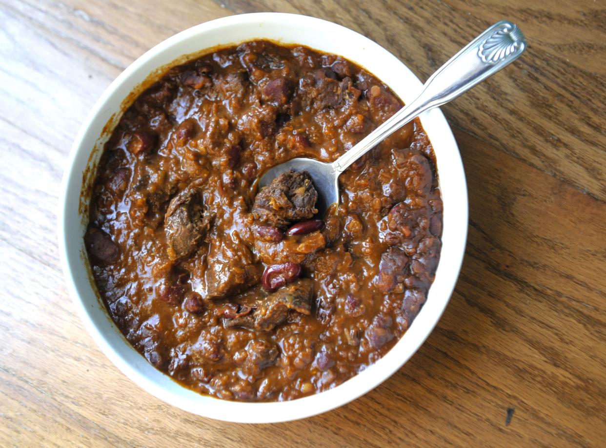 This thick, extra rich and beefy chili is wonderful on its own, as a topping or a filling.