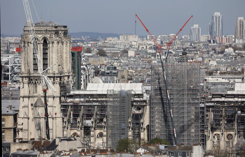 PARIS, FRANCE - APRIL 04: Notre-Dame de Paris Cathedral is seen almost four years after fire ravaged the emblematic monument on April 04, 2023 in Paris, France. On April 15, 2019, a fire broke out in the heart of Notre-Dame de Paris. For about 15 hours, firefighters fought against the flames that ravaged this historic monument in the French capital. Almost four years later, the last stages of securing continue. The great void is thus filled by metal scaffolding, which surrounds the entire site, serving in particular to consolidate the vaults with the assistance of wooden hangers. These same steel tubes will also be used, in the future, to clean up the walls contaminated by the lead emitted during the fire. The securing of the building, between the stabilization of the structure, the replacement of stones and the solidification of the vaults, will have cost 165 million euros. The origin of the flames remains, for the moment, still unknown. (Photo by Chesnot/Getty Images)