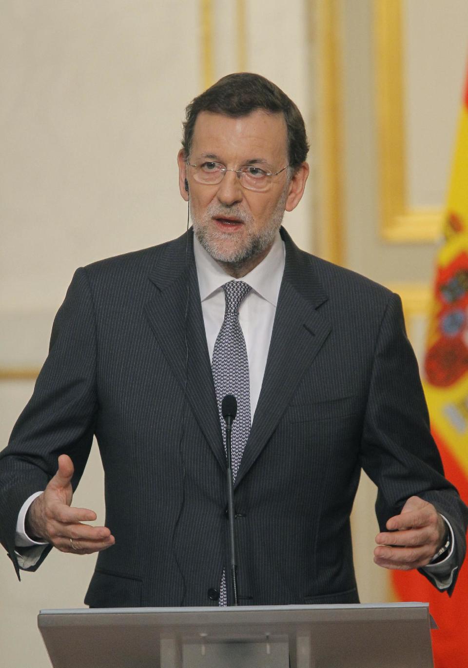 Spain's Prime Minister Mariano Rajoy gestures during his meeting with French President Francois Hollande, unseen, in Elysee Palace, Paris, Wednesday, May 23, 2012. (AP Photo/Jacques Brinon)