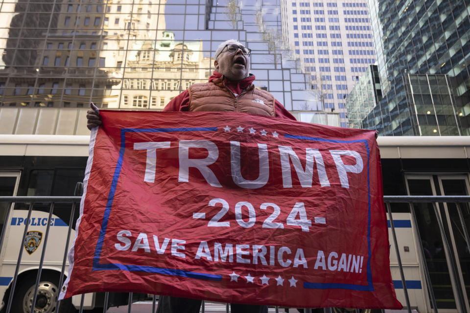 A supporter of former President Donald Trump protests outside Trump Tower in New York, Monday, April. 3, 2023. (AP Photo/Yuki Iwamura)