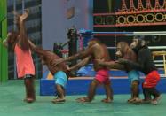 Orangutans perform during a show at Safari World, a large zoo on the outskirts of Bangkok