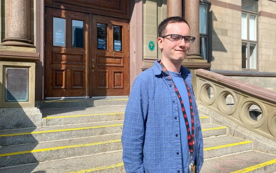 Douglas Wetmore, a member of It’s More than Buses, stands outside Halifax City Hall. The group advocates for better transit in Halifax and tracks ongoing issues.