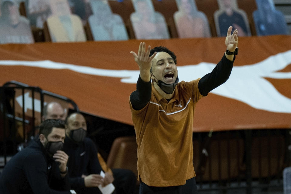 Texas head coach Shaka Smart calls out to his team during the second half of an NCAA college basketball game against West Virginia, Saturday, Feb. 20, 2021, in Austin, Texas. (AP Photo/Michael Thomas)