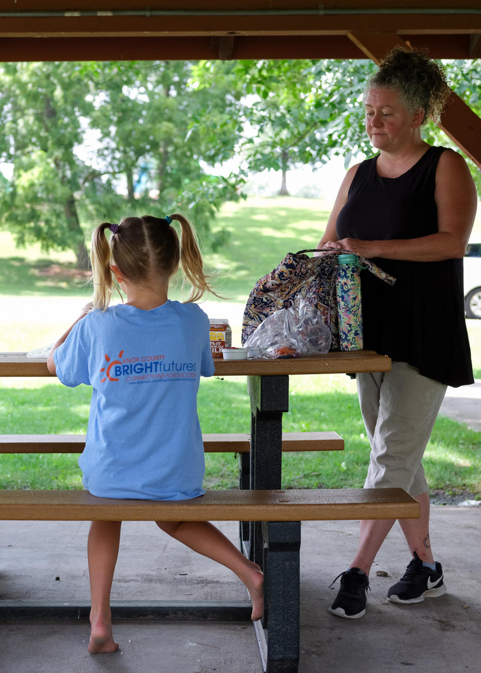 Image: Erin McAlvany at a meal site in Kirksville, Mo. on  Aug.16, 2022. (Arin Yoon for NBC News)
