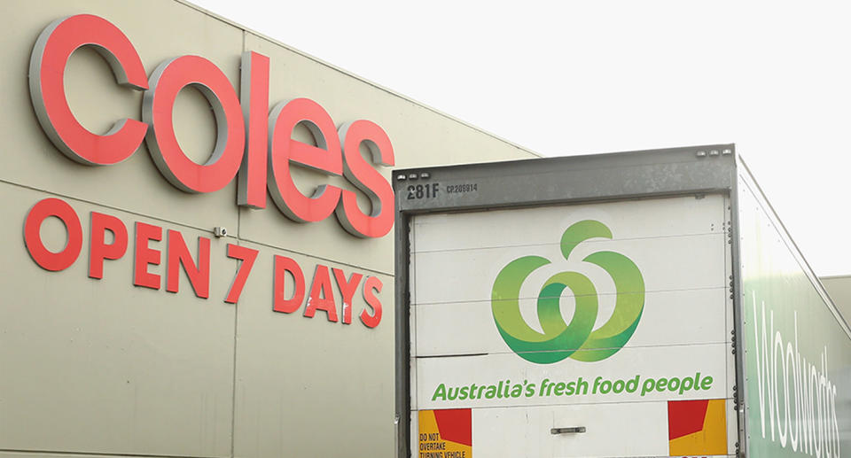 Coles sign and Woolworths truck