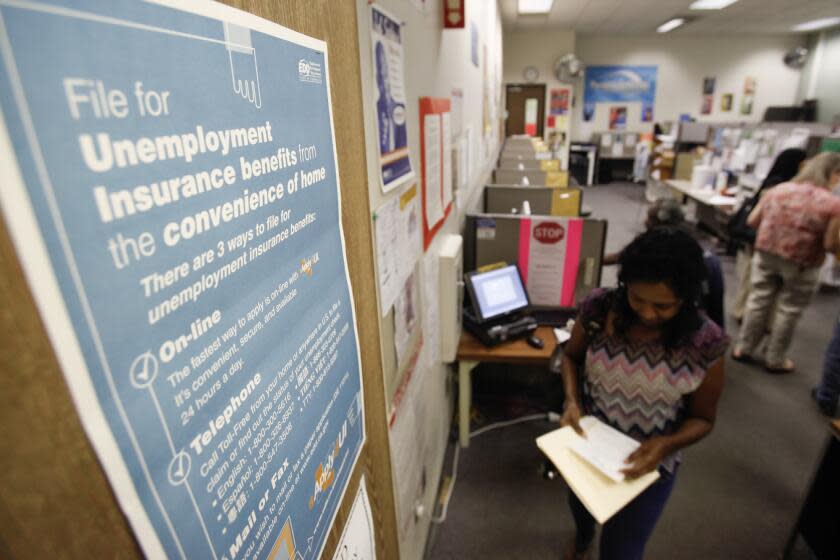 A poster explains ways to file for unemployment insurance benefits at