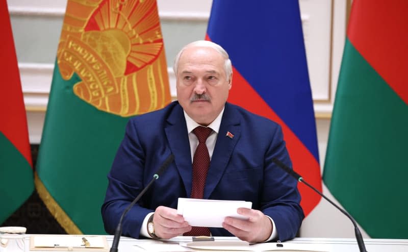 Belarusian President Alexander Lukashenko attends a joint statement with Russian President Vladimir Putin at the Independence Palace in Minsk.  -/Kremlin/dpa