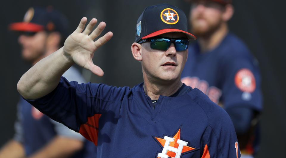 Astros manager A.J. Hinch is one of the mastermind's behind his team's four-man outfield experiment. (AP)