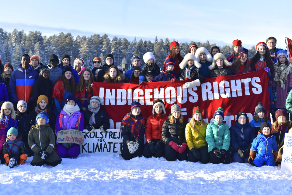 FILE - Swedish climate activist Greta Thunberg, front center left, takes part in a climate strike with Sami children in Jokkmokk, Sweden, Feb. 7, 2020. Two independent U.N. human rights experts called Thursday Feb. 10, 2022, on Sweden’s government not to issue a license to industrial backers of a planned iron-ore mine that environmentalists say would generate large amounts of toxic waste and other pollution. (Naina Helen Jama/TT News Agency via AP, File)