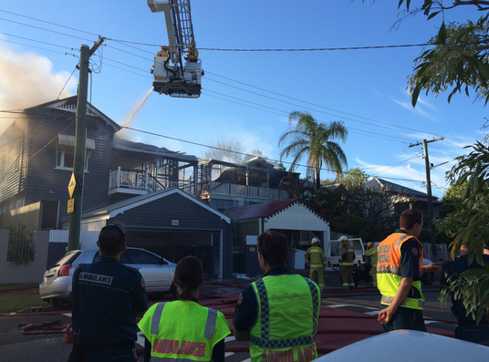 Queensland Ambulance Service shared a photo of the aftermath of the house fires at Paddington. Photo: QAS Twitter