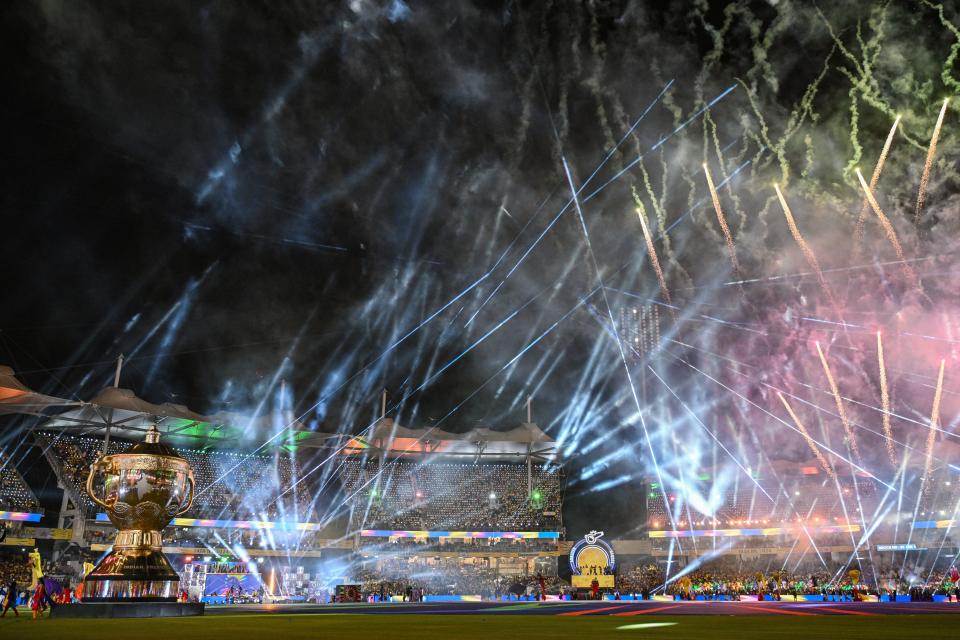 Fireworks explode over the MA Chidambaram Stadium during the opening ceremony of the Indian Premier League (IPL) before the start of Twenty20 cricket match between Chennai Super Kings and Royal Challengers Bangalore, in Chennai on March 22, 2024.