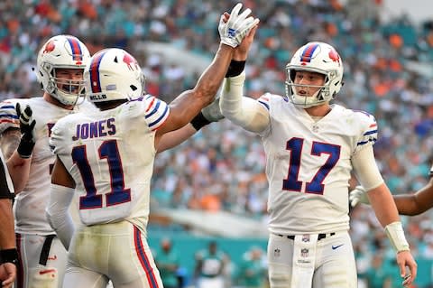 Buffalo Bills quarterback Josh Allen (17) celebrates with wide receiver Zay Jones (11) after a two-point conversion during the second half against the Miami Dolphins at Hard Rock Stadium - Credit: Jasen Vinlove/USA TODAY