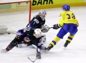 Ice Hockey - 2018 IIHF World Championships - Semifinals - Sweden v USA - Royal Arena - Copenhagen, Denmark - May 19, 2018 - Mattias Janmark of Sweden scores. REUTERS/David W Cerny