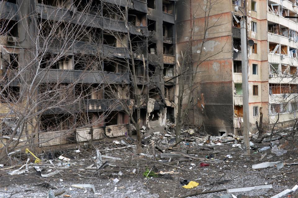 The burnt out remains of a building destroyed by Russian army shelling in the second largest Ukrainian city of Kharkiv, in the east of the country on March 6, 2022. - On the eleventh day of Russia's invasion of Ukraine on March 6, 2022, Russian forces pressed a siege of the key southern port of Mariupol and destroyed an airport in the west of the country. The Ukrainian capital Kyiv remains under Ukrainian control as does Kharkiv in the east, with the overall picture of the Russian ground advance little changed over the last 24 hours in the face of fierce Ukrainian resistance. (Photo by Sergey BOBOK / AFP) (Photo by SERGEY BOBOK/AFP via Getty Images)