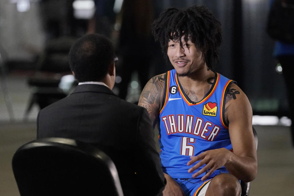 Oklahoma City Thunder guard Jaylin Williams (6) is interviewed during an NBA basketball media day Monday, Sept. 26, 2022, in Oklahoma City. (AP Photo/Sue Ogrocki)