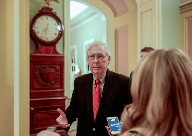U.S. Senate Majority Leader Mitch McConnell (R-KY) leaves for the night after the day's efforts to wrap up work on coronavirus economic aid legislation