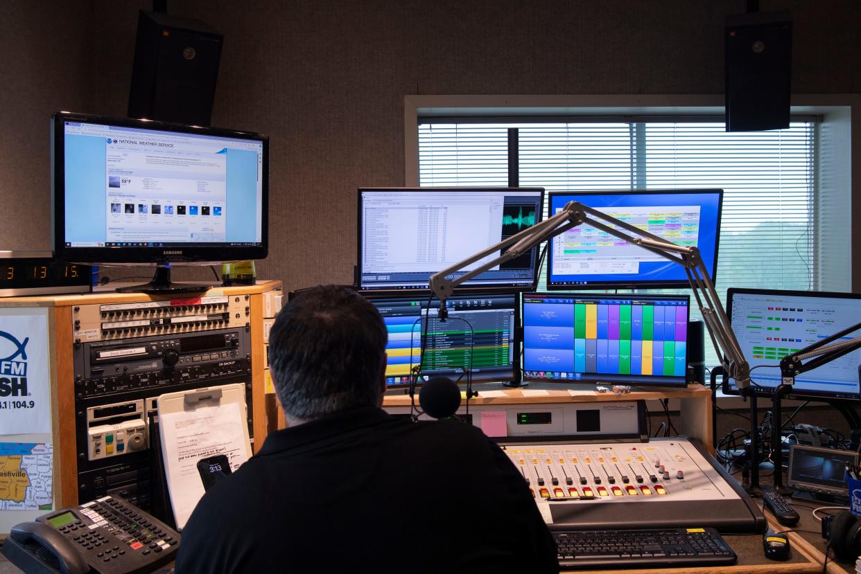 Doug Griffin, takes calls on 94FM The Fish at The Fish radio station in Nashville, Tenn., Friday, April 19, 2024.