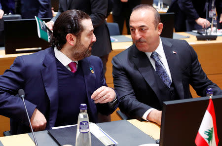 Lebanese Prime Minister Saad Al-Hariri and Turkish Foreign Minister Mevlut Cavusoglu attend an international peace and donor conference for Syria, at the European Union Council in Brussels, Belgium, March 14, 2019. REUTERS/Francois Lenoir