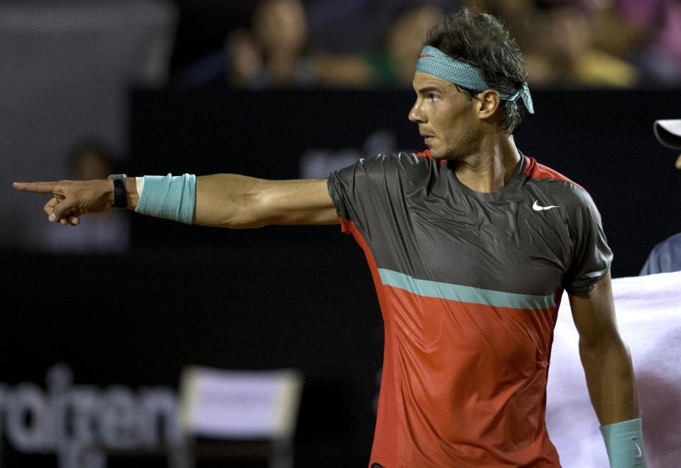 Rafael Nadal, of Spain, gestures during his match with Albert Montanes, of Spain, at the Rio Open tennis tournament in Rio de Janeiro, Brazil, Thursday, Feb. 20, 2014. (AP Photo/Silvia Izquierdo)