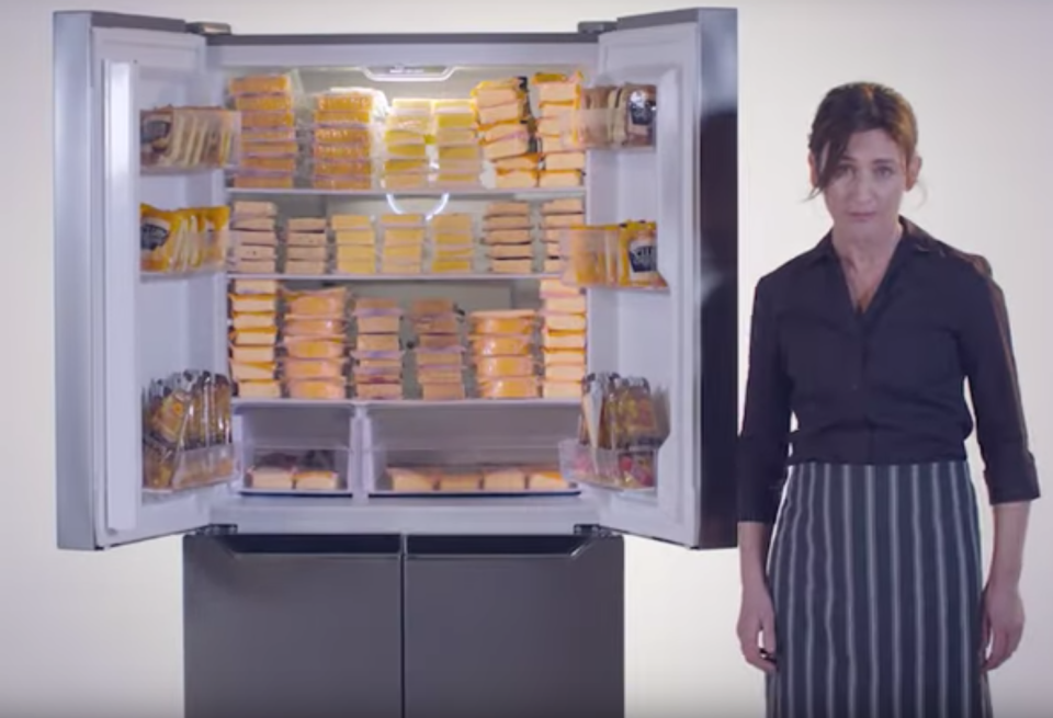 Cafe owner describing the Aldi French door fridge in the promotional video.