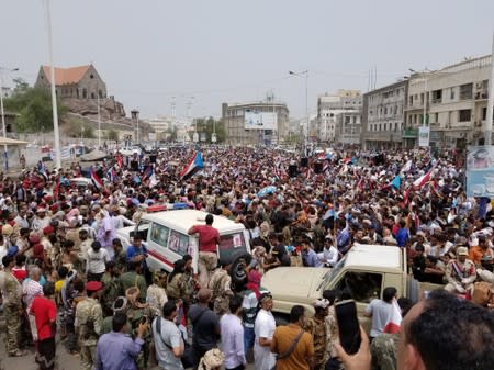 Supporters of Yemen's southern separatists gather during the funeral of Brigadier General Muneer al-Yafee and his comrades, killed in a Houthi missile attack, in Aden