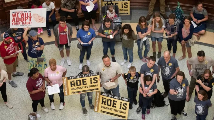 Anti-abortion demonstrators gather in the rotunda at the Capitol in Austin, Texas, in March of 2021. - Jay Janner/Austin American-Statesman/AP