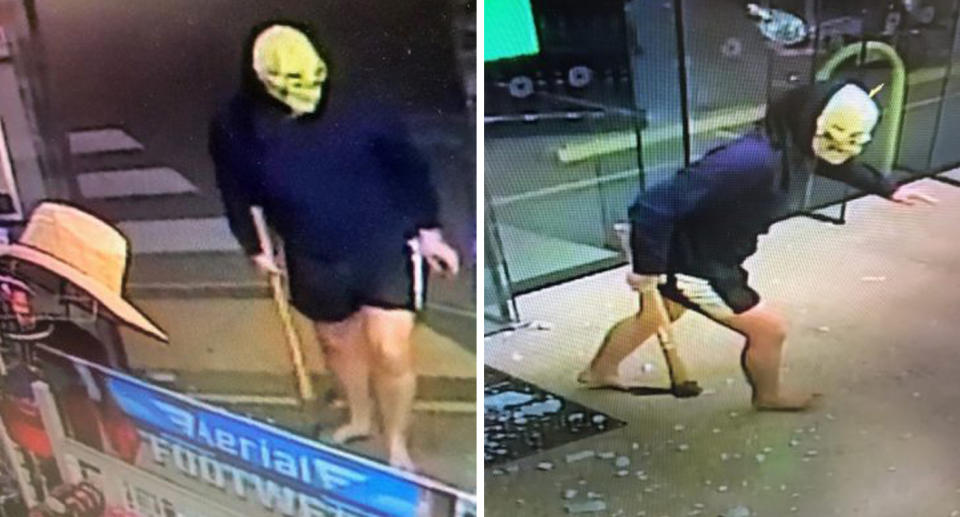 CCTV shows a masked man with an axe smashing the glass door of a Townsville service station, in an attempted armed robbery. 