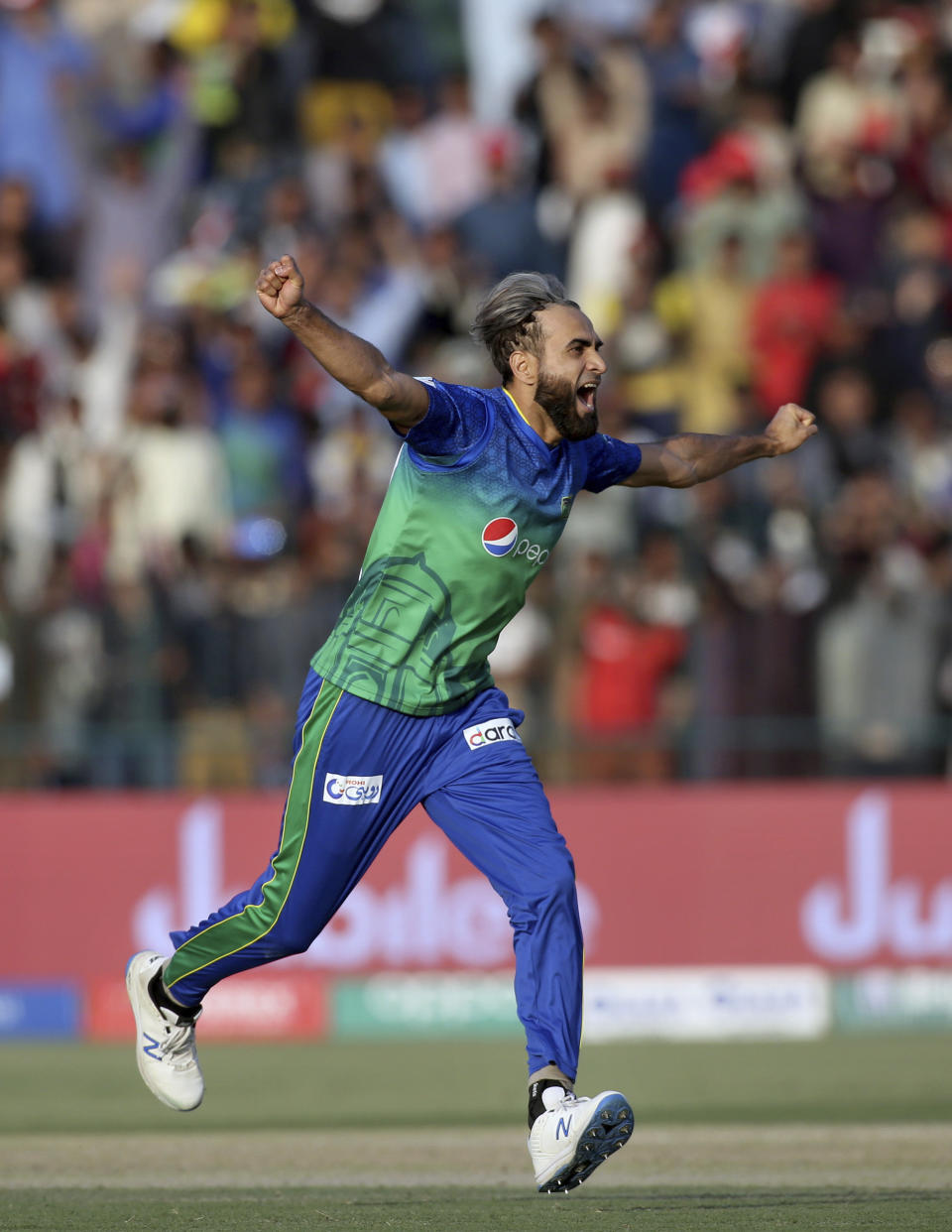 Multan Sultans spinner Imran Tahir celebrates on the dismissal of Quetta Gladiators batsman Shane Watson during their Pakistan Super League T20 cricket match in Multan, Pakistan, Saturday, Feb. 29, 2020. (AP Photo/K.M. Chaudary)