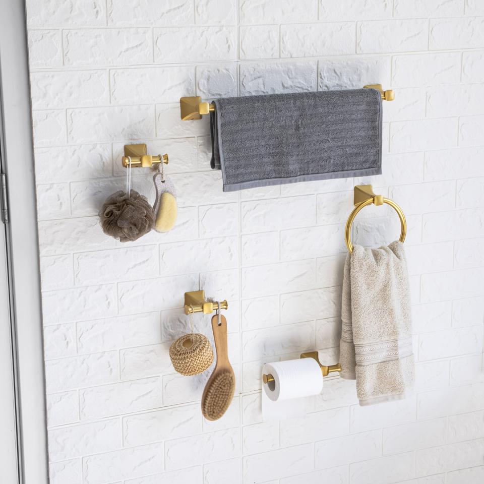 the brass bath hardware set mounted in a shower