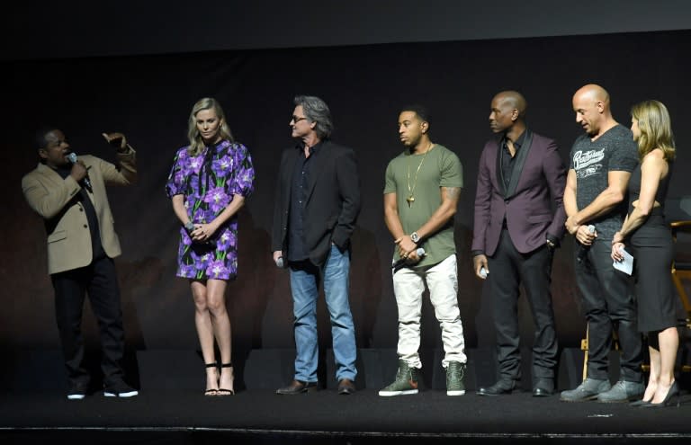 (From L) Director F. Gary Gray, actors Charlize Theron, Kurt Russell, Ludacris, Tyrese Gibson and Vin Diesel speak onstage at a Universal Pictures' presentation during CinemaCon, at Caesars Palace in Las Vegas, Nevada, on March 29, 2017