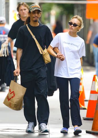 <p>Fernando Ramales / BACKGRID</p> Model Lily-Rose Depp and her boyfriend Yassine Stein take a walk together through NYC