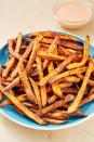 <p>We love a good, crispy <a href="https://www.delish.com/cooking/recipe-ideas/recipes/a45026/salt-n-pepper-sweet-potato-fries-recipe/" rel="nofollow noopener" target="_blank" data-ylk="slk:sweet potato fry;elm:context_link;itc:0;sec:content-canvas" class="link ">sweet potato fry</a>. Though the oven-baked variety is great, these air fryer fries get even crispier, are healthier, and take way less time! Paired with our favorite 3-ingredient secret sauce (use vegan or low-cal mayo!), we can't think of a better snack.</p><p>Get the <strong><a href="https://www.delish.com/cooking/recipe-ideas/a28136123/air-fryer-sweet-potato-recipe/" rel="nofollow noopener" target="_blank" data-ylk="slk:Air Fryer Sweet Potato Fries recipe;elm:context_link;itc:0;sec:content-canvas" class="link ">Air Fryer Sweet Potato Fries recipe</a></strong>.</p>