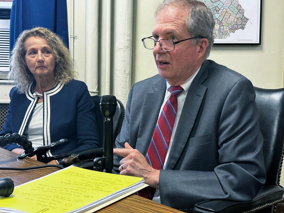 New Hampshire Deputy Secretary of State Patricia Lovejoy, left, looks on as Secretary of State David Scanlan explains that he will not use an amendment to the U.S. Constitution to block former President Donald Trump from the ballot in the state that will hold the first Republican presidential primary next year, at the Statehouse, in Concord, N.H., Wednesday, Sept. 13, 2023.