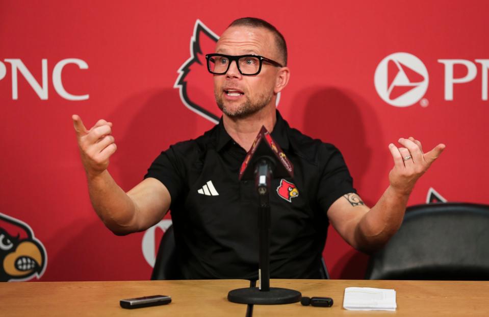 Louisville men's basketball coach Pat Kelsey updates the media about the program during a news conference June 27.