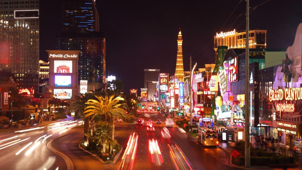 "Las Vegas, USA - April 9, 2011: Traffic blurs along the Las Vegas strip.