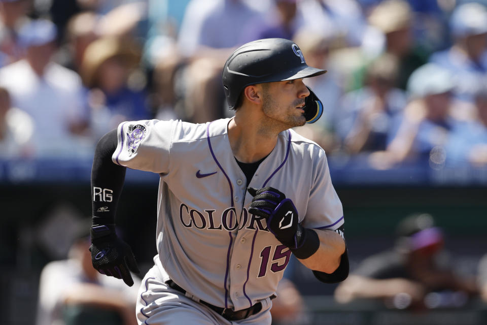 Colorado Rockies batter Randal Grichuk runs to first base after hitting an RBI-single during the first inning of a baseball game against the Kansas City Royals in Kansas City, Mo., Saturday, June 3, 2023. (AP Photo/Colin E. Braley)