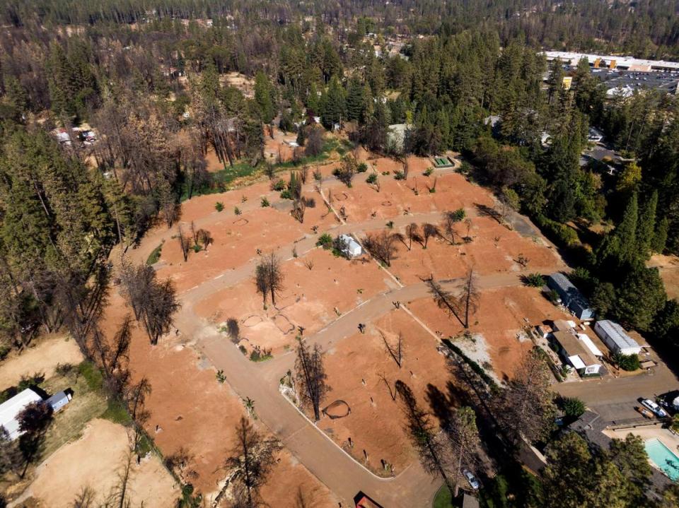 Nearly a year after it was destroyed by the Camp Fire, most of the lots in the Pine Grove Mobile Home Park in Paradise are empty, as shown in this Oct. 15, 2019 drone image.