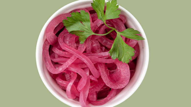 Ramekin of red onions and cilantro