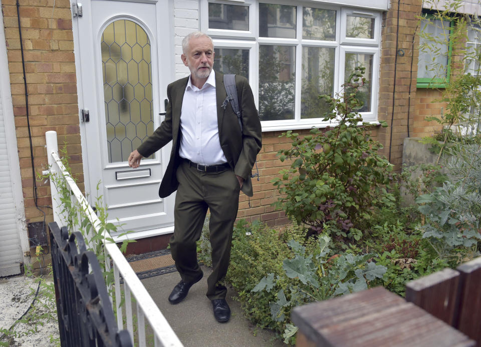 Britain's Labour party leader Jeremy Corbyn leaves his house in London ahead of a meeting of the party's National executive Committee, in London, Tuesday Sept. 4, 2018. Labour's ruling body will decide whether to fully adopt an international definition of anti-Semitism as the row over the party's response to the problem continued to simmer. (Nick Ansell/PA via AP)