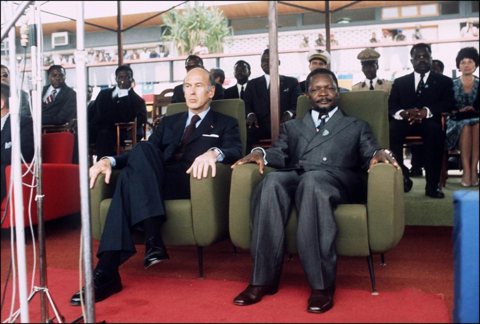 Giscard with the President of the Central African Republic Jean-Bédel Bokassa at a ceremony in Bangui, during the official visit of the French president in 1975 - AFP/Getty