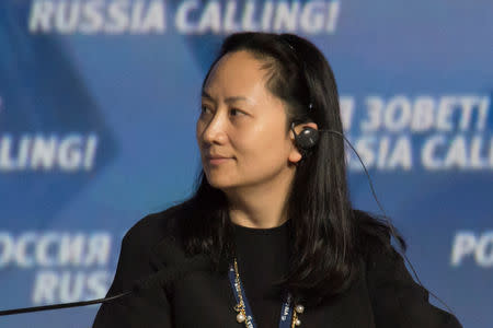 FILE PHOTO: Meng Wanzhou, Executive Board Director of the Chinese technology giant Huawei, attends a session of the VTB Capital Investment Forum "Russia Calling!" in Moscow, Russia October 2, 2014. Picture taken October 2, 2014. REUTERS/Alexander Bibik/File Photo