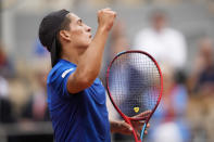 Argentina's Sebastian Baez clenches his fist after scoring a point against Germany's Alexander Zverev during their second round match at the French Open tennis tournament in Roland Garros stadium in Paris, France, Wednesday, May 25, 2022. (AP Photo/Christophe Ena)