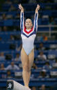 ATHENS - AUGUST 23: Carly Patterson of Unites States competes in the women's artistic gymnastics balance beam finals on August 23, 2004 during the Athens 2004 Summer Olympic Games at the Olympic Sports Complex Indoor Hall in Athens, Greece. (Photo by Ezra Shaw/Getty Images)