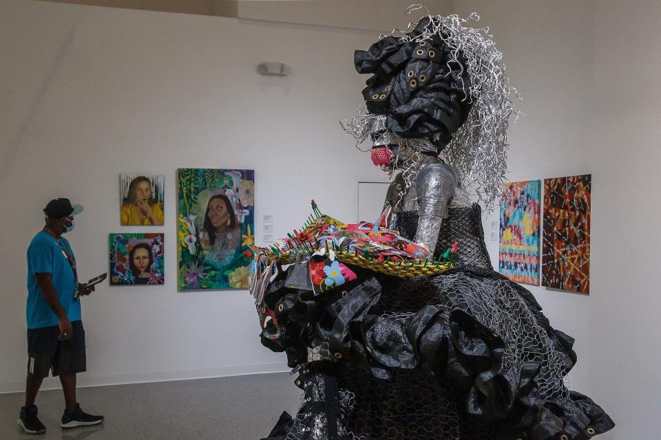 Sculpture by Emilio Apontesierra-Paretti, center, at the ÒBeing Heard, Being SeenÓ art exhibit by local artists who identify as LGBTQ+ at the Cultural Council of Palm Beach County in downtown Lake Worth Beach, Fla., on Wednesday, March 16, 2022.